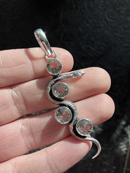 Crystal Pendant of a Curvy Snake with 4 Faceted Topaz Gems #eKzBjIeSxBw