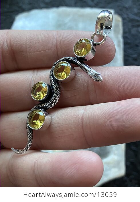 Crystal Pendant of a Curvy Snake with 4 Faceted Yellow Citrine Gems - #lGEruvArSh4-1